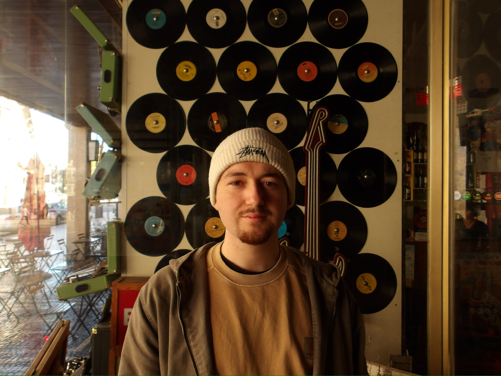 Portrait of Elia Ritzmann standing on a bridge in Zurich